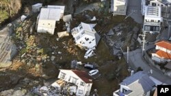 Casas destruidas por un sismo en Kanazawa, en la prefectura de Ishikawa, Japón, en una imagen del martes 2 de enero de 2024. (Kyodo News via AP)