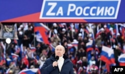 Putin en el concierto-manifestación "Primavera de Crimea", 18 de marzo de 2022. Fuente: AFP/SCANPIX
