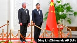 Miguel Díaz-Canel y el presidente chino Xi Jinping en Pekín el 25 de noviembre de 2022.