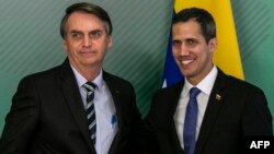 Jair Bolsonaro, presidente de Brasil, y Juan Guaidó, presidente interino de Venezuela. 