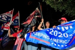Cubanos se manifiestan dando la victoria a la reelección de Donald Trump en la Florida..