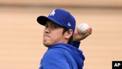 Shohei Ohtani, pitcher de los Dodgers de Los Angeles, entrenando el 25 de marzo de 2024. (AP Photo/Jae C. Hong).
