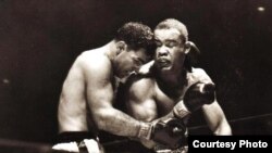 Rocky Marciano y Joe Louis.