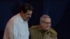 Nicolás Maduro y Raúl Castro durante una cumbre del ALBA en La Habana, en diciembre de 2028. (Yamil LAGE/AFP)