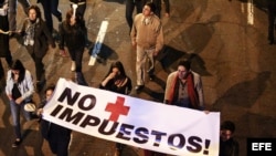 Protesta contra el Gobierno de Ecuador por dos proyectos legales sobre las herencias y la plusvalía inmobiliaria (15 junio, 2015).