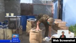 Productos incautados en fábrica ilegal de mantequilla, en Camagüey, según reporte de la televisión estatal. 