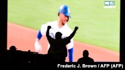 Los Dodgers de Los Angeles celebran su victoria. Son los campeones de las Ligas Mayores. (Frederic J. Brown / AFP).