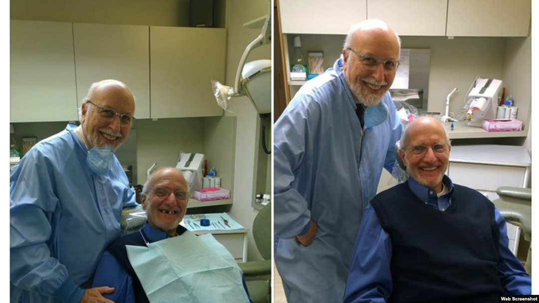 Alan Gross junto a su dentista.