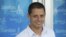 El delantero mexicano,  Javier Hernández 'Chicharito', a su salida de la Clínica Sanitas de La Moraleja tras pasar las pruebas médicas, previas a la confirmación de su incorporación a las filas del Real Madrid.