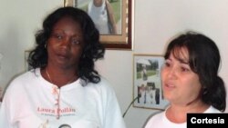 La actual líder de las Damas de Blanco, Berta Soler junto a Laura Labrada