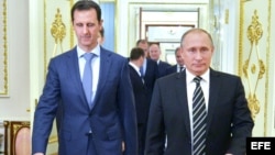 Vladimir Putin junto a su homólogo sirio Bachar al-Asad. EFE