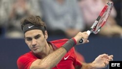 El suizo Federer derrotó al croata Karlovic 7-6 (8), 3-6, 6-3.
