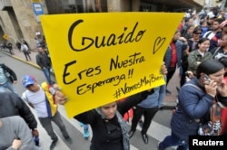 Seguidores de Guaidó durante una manifestación de apoyo en Bogotá, durante la reunión del Grupo de Lima.