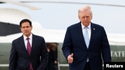 El presidente Donal Trump y el secretario de Estado, Marco Rubio