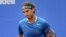 Rafael Nadal, se lamenta por la pérdida de un punto durante el partido de cuartos de final disputado ante su compatriota Nicolás Almagro en la quinta jornada del Trofeo Open Banc Sabadell 62 Trofeo Conde de Godó de Tenis.