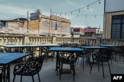 El icónico restaurante "La Guarida" sufre el impacto de la crisis co mo otros negocios privados en Cuba. (Adalberto Roque/AFP)