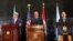 El secretario de Estado de EE.UU., John Kerry (i), en una rueda conjunta con el secretario general de la ONU, Ban Ki-moon (d), y el ministro de relaciones Exteriores de Egipto, Sameh Shoukry (c).