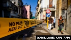 Una calle de La Habana cerrada por COVID-19. (YAMIL LAGE / AFP)