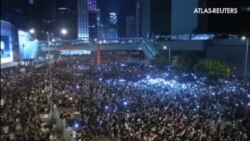 Miles de manifestantes siguen desafiando al régimen chino en las calles de Hong Kong