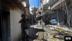 Soldados sirios durante un patrullaje en un área de Damasco (Siria) en noviembre de 2012 