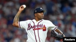 Raisel Iglesias retiró un inning en blanco en su debut en Juegos de Estrellas.