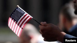 Un nuevo ciudadano de EEUU, durante una ceremonia de naturalización en Nueva York, en septiembre del 2019.