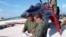 El expiloto de guerra cubano Luis Raúl González Pardo Rodríguez (izq.), acusado en en el caso del asesinato de cuatro pilotos de Hermanos al Rescate.