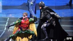 Robin (i)y Batman (d), en acción…