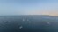 (ARCHIVO) Una vista aérea muestra barcos fondeados frente a la costa de Khasab, en la gobernación omaní de Musandam, cerca del estrecho de Ormuz, el 2 de octubre de 2026.