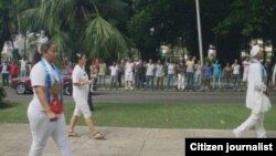 Reporta Cuba. Damas de Blanco marchan por 5ta Avenida. Foto: Ángel Moya.