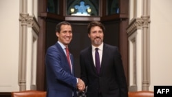 El premier canadiense Justin Trudeau recibió a Juan Guaidó en Ottawa, Canada. (Photo by Dave Chan / AFP)