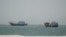 Buques en el Estrecho de Ormuz, vistos desde Musandam, Oman, este 24 de junio.