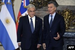 En esta foto de archivo, el presidente argentino Mauricio Macri (derecha) aparece junto a su homólogo de Chile, Sebastián Piñera.