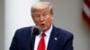 El presidente Donald Trump habla desde el Jardín de las Rosas, en la Casa Blanca, el martes 14 de abril del 2020.