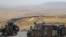 Combatientes kurdos peshmerga toman posiciones en el monte Qarachogh, en el distrito de Makhmur. La coalición liderada por Estados Unidos, desplegada en Irak hace más de una década para combatir a los yihadistas, concluyó su misión el 30 de septiembre de 2026.