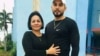 Ailex Marcano Fabelo, junto a su hijo, detenido el 11J en Camagüey.