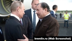 Vladimir Putin junto a Daniel Ortega, durante una visita a Managua, en julio de 2014. El presidente de Rusia definió entonces a Nicaragua como "socio importante para Rusia en América Latina".