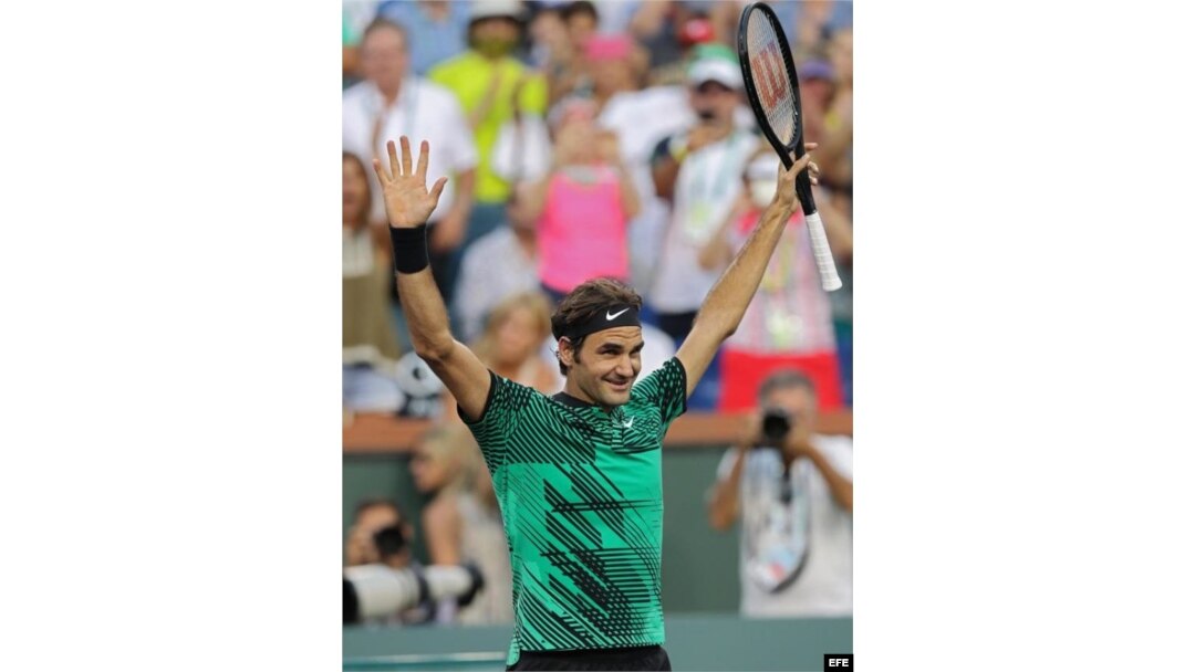 Federer celebra tras vencer a Nadal.