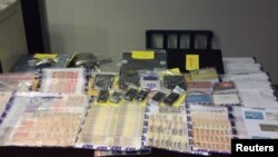 Documentos de la Interpol de una investigación en Honk Kong sobre juegos ilegales durante la Copa Mundial. 