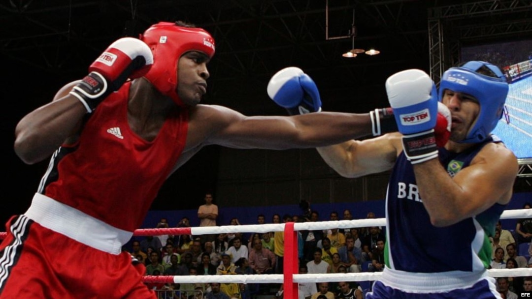Robert Alfonso (i), se enfrenta al brasileño Antonio Nogueira, por las semifinales de la categoría +91 kg, en el marco de los Juegos Panamericanos Río de Janeiro 2007.