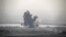 Fotografía que muestra una columna de humo causada por los enfrentamientos que tienen lugar entre la armada siria del presidente Bachar Al Assad y la armada de la oposición, cerca del pueblo sirio de Al-Rafide, 