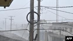 Lluvia intensa y fuentos en Candelaria, Artemisa, en medio del azote del huracán Rafael. 