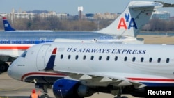 Aviones de US Airways y American Airlines en el aeropuerto Ronald Reagan en Arlington, Virginia, EE UU. 