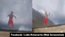 El cubano Oscar Echevarría Rubio protesta en Sancti Spiritus contra el régimen cubano.