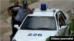 Carro policial. Vigilancia a disidentes en Holguín, Robier Cruz/ Reporta Cuba.