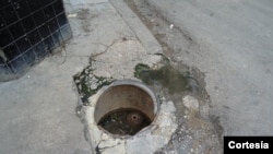 Registro de agua en una calle de La Habana