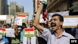 Fotografía de archivo de manifestantes sirios opositores del presidente Bachar al Asad.