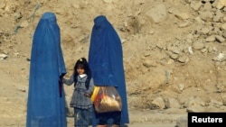 Mujeres en Kabul, Afganistán. (Reuters/Adnan Abidi).