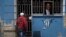 Una foto del presidente de EEUU Barack Obama a la entrada de una casa, en La Habana (21 de marzo, 2016).