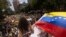Marcha de apoyo a la oposición venezolana en la Ciudad de México. REUTERS/Quetzalli Nicte-Ha